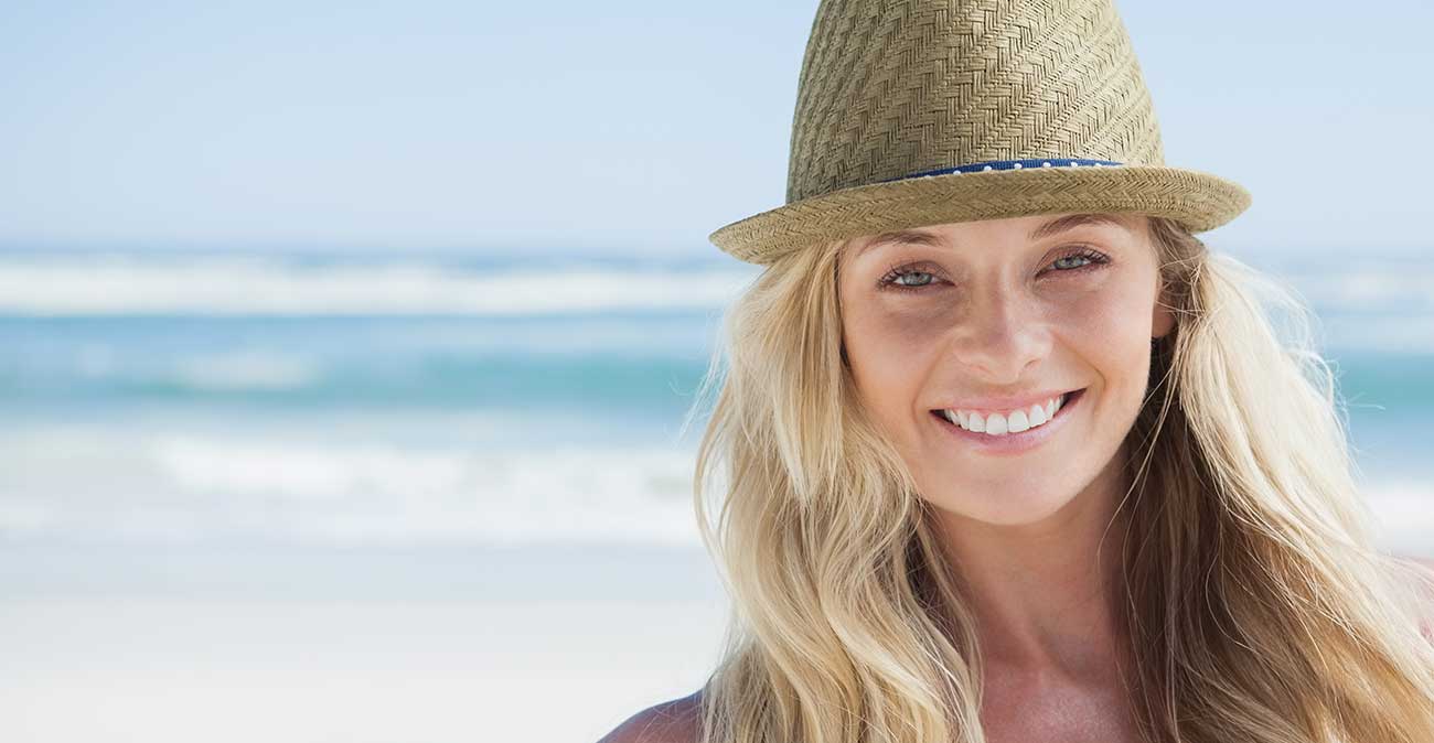 Girl Smiling On Beach